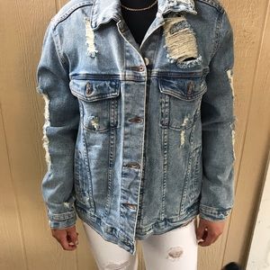 Distressed jean jacket